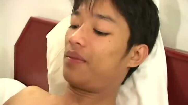 Feminine gay Asian sucks cock