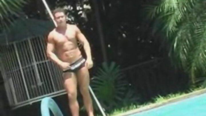 Beefcake cock sucking in the pool